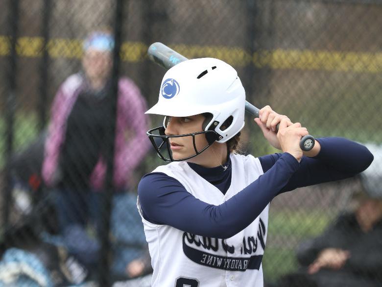 Student playing softball for Penn State Brandywine 